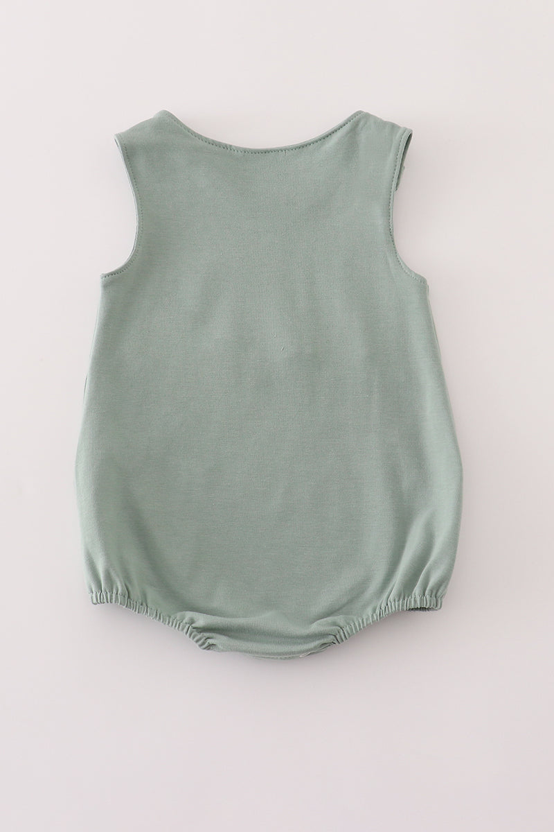 Green character applique bubble