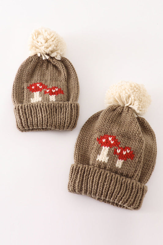 Brown pompom mushroom cable beanie