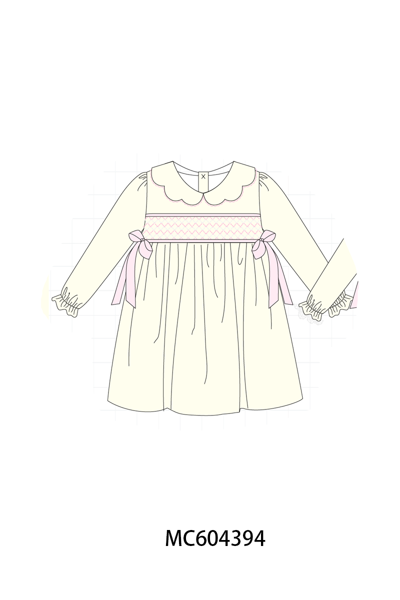 Cream smocked bow dress